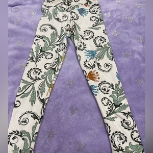 Brand new gorgeous kids s-m (2-6) cream floral leggings.‎